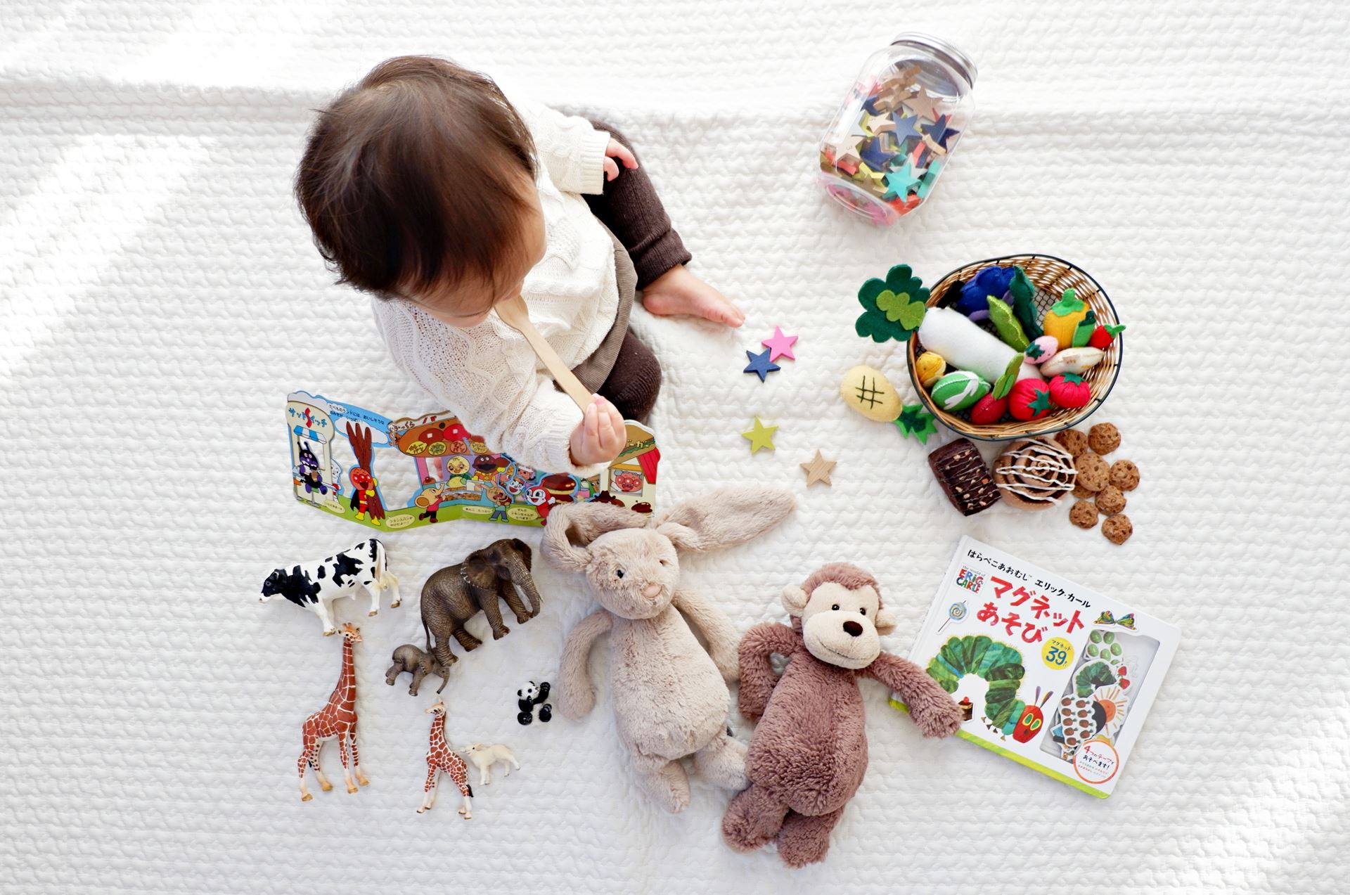 a group of stuffed animals sitting on top of a table